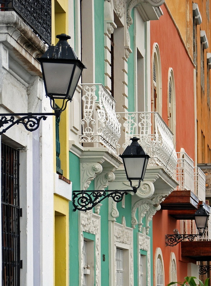 Lamps and balconies on brightly colored buildings, San Juan, Puerto Rico